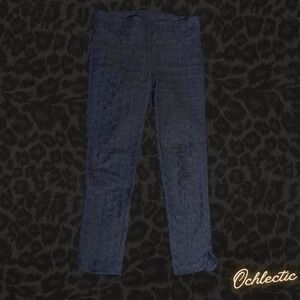 Black textured cotton pants with stretch and circle print